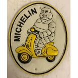 A modern painted cast iron sign inscribed "Michelin", approx 24.