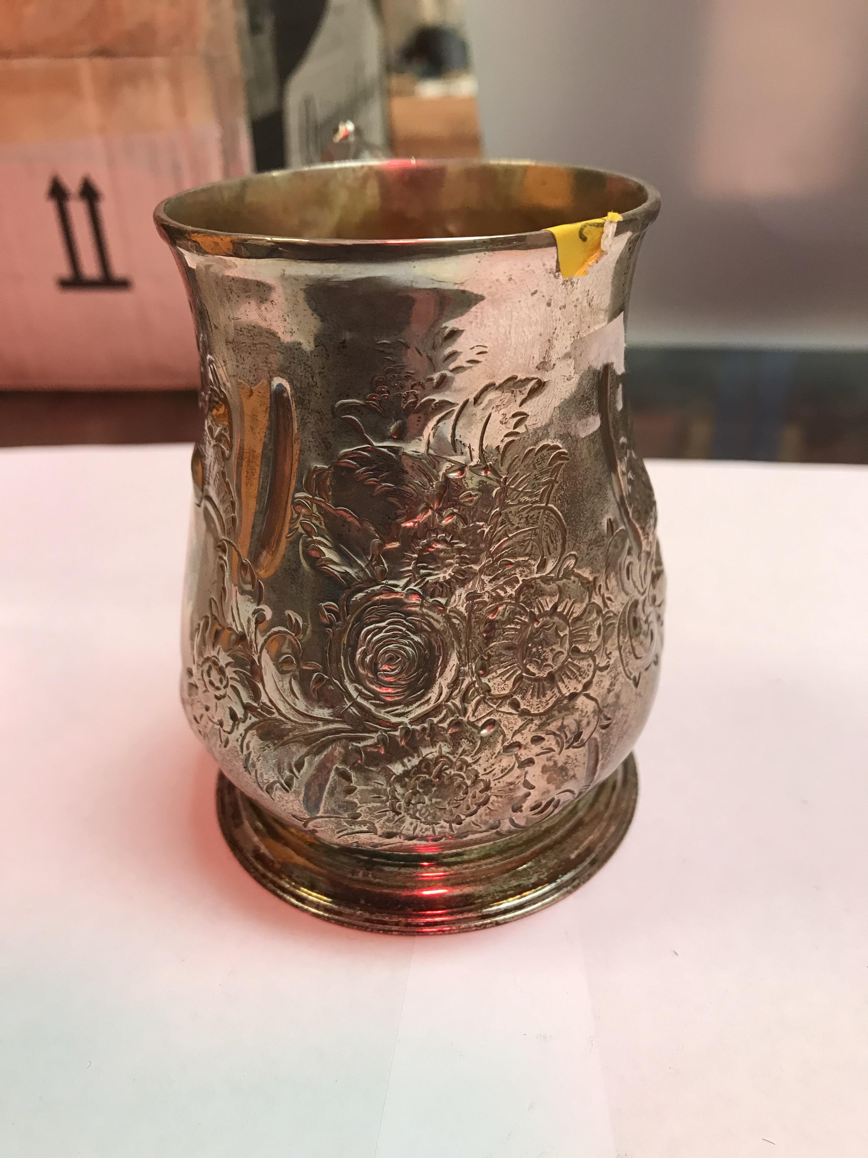 A George II silver baluster shaped mug with later foliate engraved decoration, - Image 20 of 42