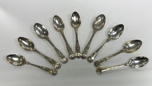 A composite set of nine "King's" pattern dessert spoons,