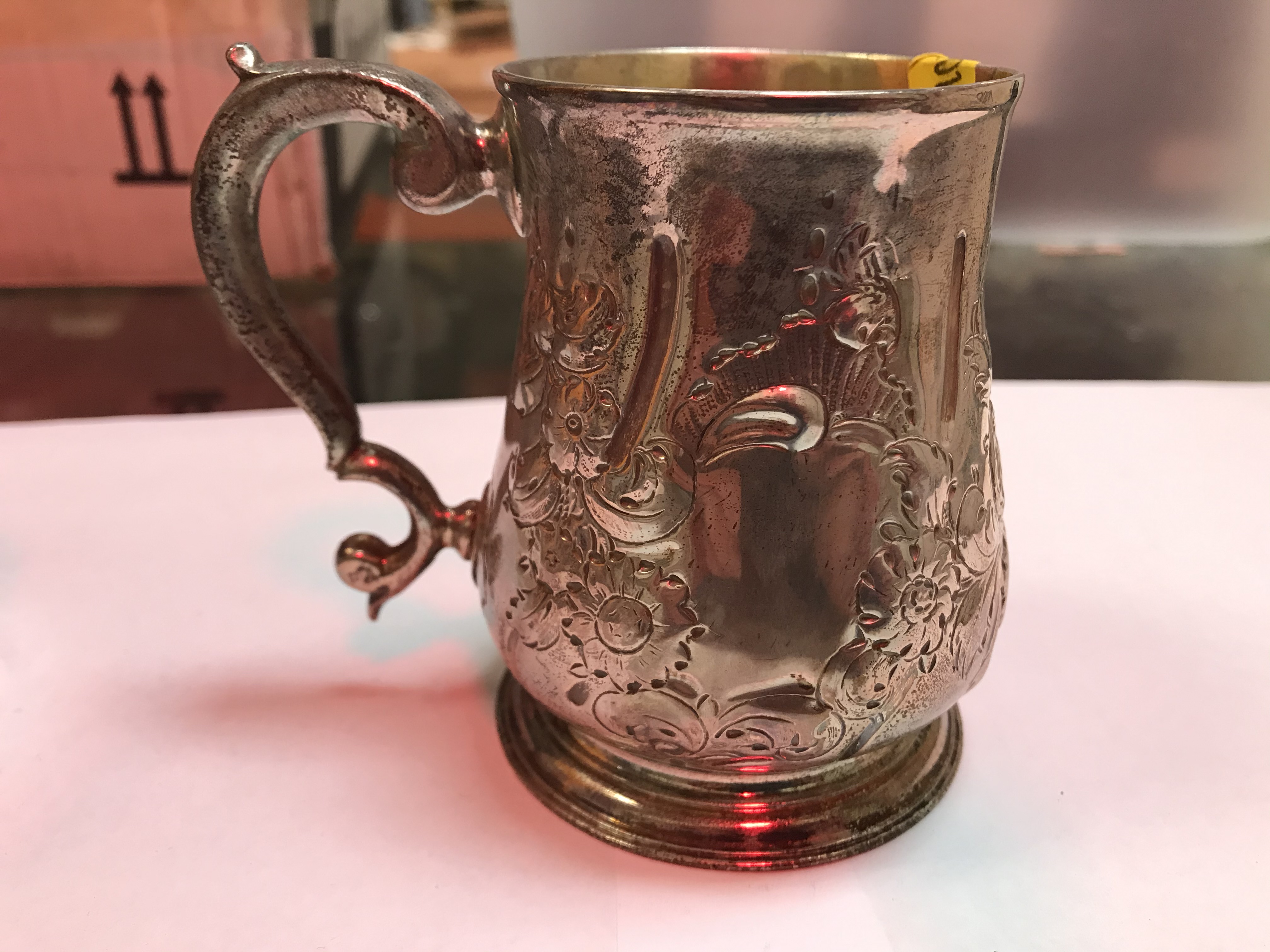 A George II silver baluster shaped mug with later foliate engraved decoration, - Image 18 of 42