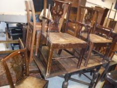 A set of six (4 + 2) oak Hepplewhite style chairs with leather upholstered seats,