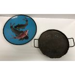 A circa 1900 Chinese cloisonne circular dish decorated with three carp on a pale blue background,