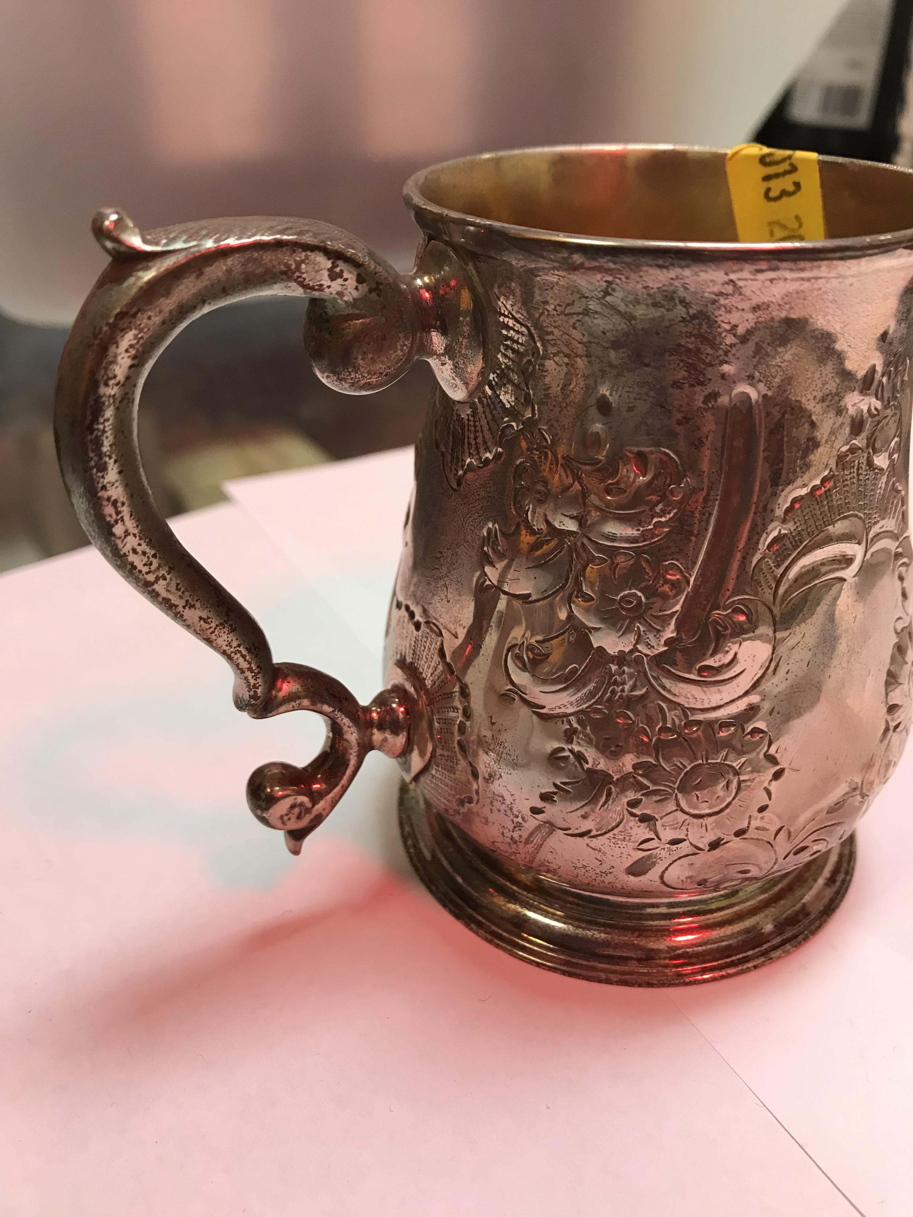 A George II silver baluster shaped mug with later foliate engraved decoration, - Image 19 of 42