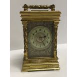 A late 19th century gilt brass cased French carriage clock,