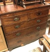A 19th Century mahogany chest, the plain top with applied moulded edge over a slim secret drawer,