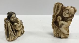 A 19th Century Japanese Meiji period carved ivory netsuke as a mother and child,