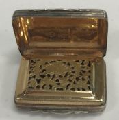 A George III silver vinaigrette of rectangular form with engraved decoration,