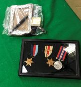 A World War II 1939-45 Star, Africa Star with Eighth Army bar and Defence medal,