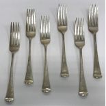 A composite set of six Victorian "Hanoverian" pattern table forks (by George W Adams for Chawner &