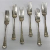 A composite set of six Victorian "Hanoverian" pattern table forks (by George W Adams for Chawner &