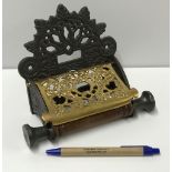 A Victorian style cast metal and brass toilet roll holder, approx 17.