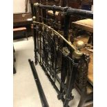 A Victorian brass and iron bedstead,