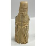 A 19th Century Chinese carved ivory figure of a sage bearing two character signature mark to base,