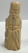 A 19th Century Chinese carved ivory figure of a sage bearing two character signature mark to base,