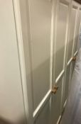 A pair of modern cream coloured and pine two door wardrobes, 90 cm wide x 53.