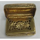 A George III silver gilt vinaigrette of rectangular form, with lozenge engraved decoration,