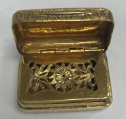 A George III silver gilt vinaigrette of rectangular form, with lozenge engraved decoration,