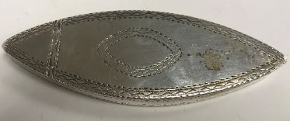 A Georgian silver snuff box of navette form with bright cut decoration, bearing maker's mark "IG",