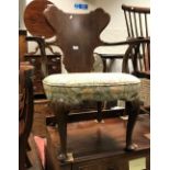 A circa 1900 walnut shaped panel back elbow chair in the early 18th Century manner,