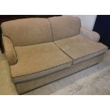 A modern fawn upholstered and green tubelined two seat sofa bed on square tapered mahogany legs 180