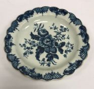 An 18th Century Worcester fruit and hop pattern dish with scalloped edge, 17.