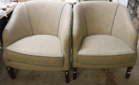 A pair of modern tub chairs with sage upholstery,