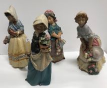 A collection of four Lladro figures of young girls, with matt finish,