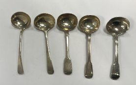 A collection of five various silver sauce ladles - two "Fiddle and Thread" pattern,