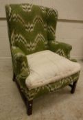 An early 20th Century wingback scroll ar