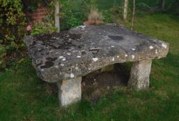 A large natural stone rectangular platfo