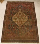 A Qushgai rug, the central panel set wit