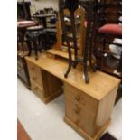 A modern pine dressing chest with mirror