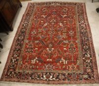 A Heriz carpet, the central panel set wi