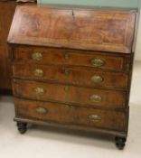 An 18th Century walnut and inlaid bureau