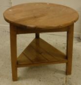 A pine cricket table, the circular plank