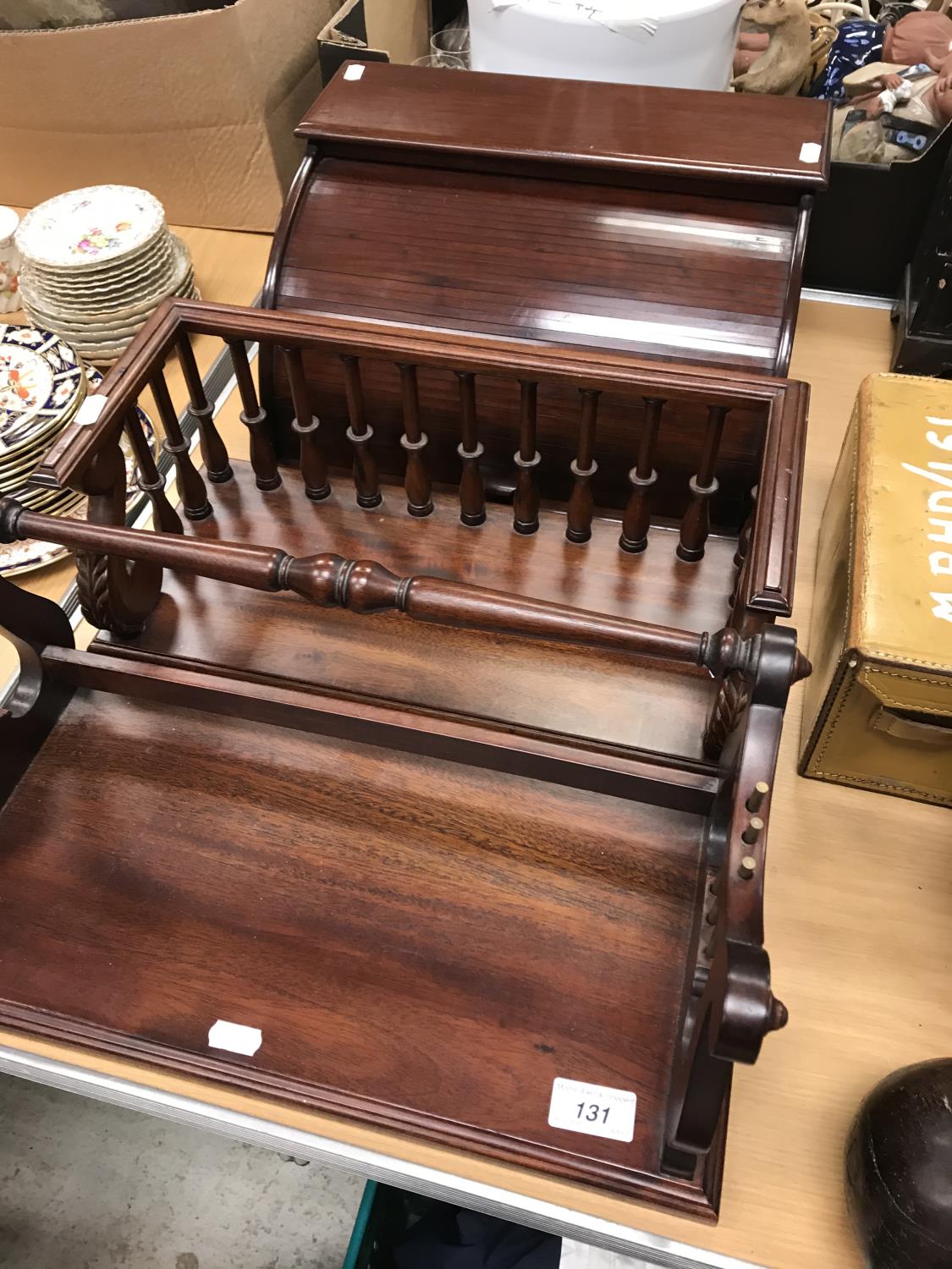 Two modern mahogany book troughs,