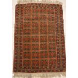 A Turkamen rug, the central panel set wi