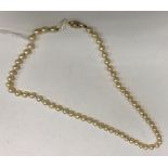 A single strand cultured pearl necklace,