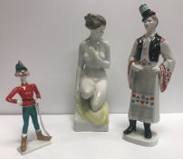 A Hungarian hand-painted porcelain figur