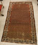 A Malayer rug, the central panel set wit
