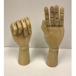 Two modern artist's wooden model hands