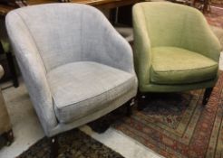 A pair of modern tub chairs, one with gr