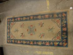 A circa 1950's Chinese rug, the central