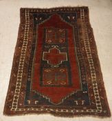 A Caucasian rug, the central panel set w