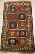 A Caucasian rug, the central panel set w