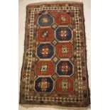 A Caucasian rug, the central panel set w