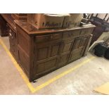 An oak dresser, the plain top with mould