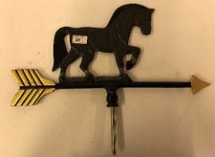 A black and gold painted cast iron "Hors