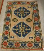 A Turkish rug, the central panel set wit