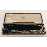 A two strand graduated pearl necklace, t